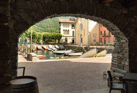 Torno, Lombardy, Italy - July 8, 2019: Central square of ancient village Torno overlooking Lake Como, Italy