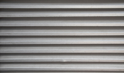 The old iron surface is a layer with scratches stains taken close-up