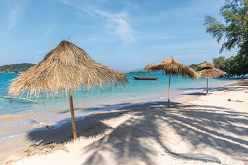 Beach Umbrella and Sunbed, Koh Mak Beach, Koh Mak island, Thailand.