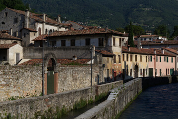 Fototapeta na wymiar Italy, Vittorio Veneto, view Serravalle neighboord and its water channels