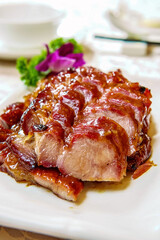 Cut Barbecued Pork On The Plate