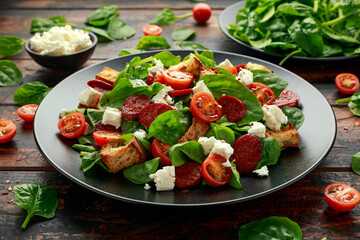 Chorizo Tomato salad with spinach, feta cheese and croutons. healthy summer food
