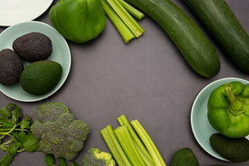 Green vegetables frame mockup. Group of raw organic assorted vegetables. Copy space.