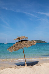 Beach Umbrella and Sunbed, Koh Mak Beach, Koh Mak island, Thailand.