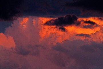 Colorful cloud patterns with golden hour light.