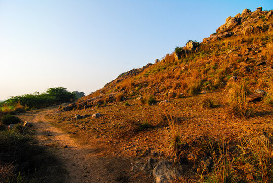 Sunrise along a mountainous path