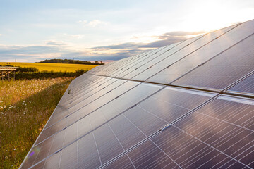 Solar panels at sunset, photovoltanic, alternative source of energy.