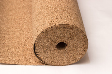 Roll of wood cork on a white background.