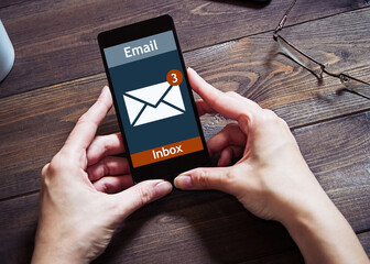 The woman received an e-mail online on a mobile phone. Message online icon.	