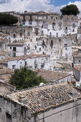 Fototapeta na wymiar Monte Sant'Angelo on Mount Gargano with white houses in Italy. Widescreen photo