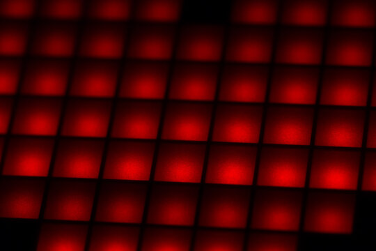 Texture Of Square Red Pixels Closeup.