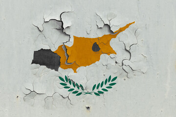 Cyprus flag close up old, damaged and dirty on wall peeling off paint to see inside surface. Vintage National Concept.
