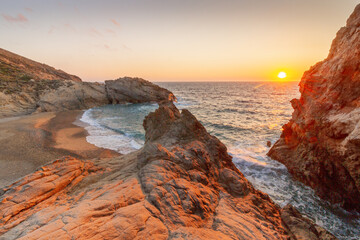 The beach of Nas, one of the most popular beaches in Ikaria (or Icaria) island, in Aegean Sea,...