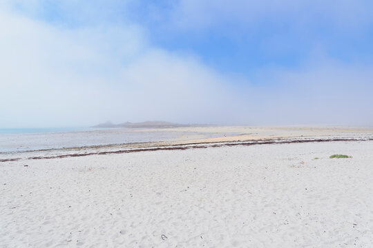A swirling sea mist moves across the Plage Sainte-Marguerite in Brittany