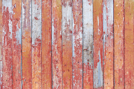 red and brown old Board with cracks from old paint, vintage grunge style with cracked surface background for your text, decoration or advertising template, retro art © svetlanaz