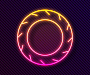 Glowing neon line Car tire wheel icon isolated on black background.  Vector Illustration