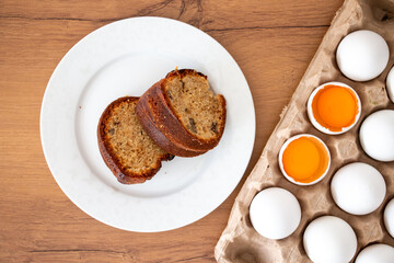 Making delicious walnut cake from eggs. slice cake with cinnamon and walnut. evaluation of broken eggs. Making delicious cakes at home.