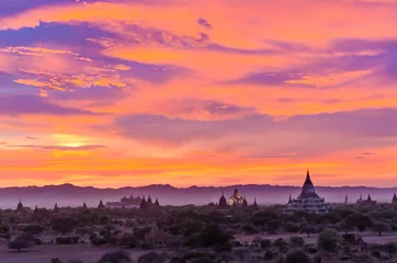 Fotobehang The Bagan temple valley seen from one of the minor shrines, at sunset © Em Campos