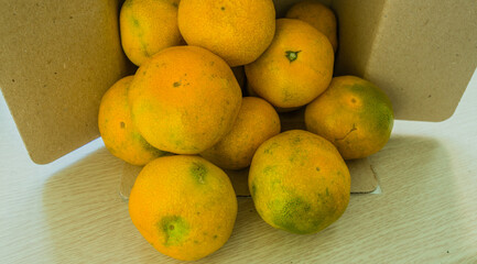 Closeup of box of tangerines