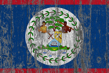 Belize flag on grunge scratched wooden surface. National vintage background. Old wooden table scratched flag surface.