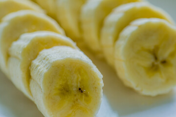 Sliced banana on white dish