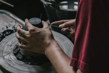 Artisan potter making art pot handicraft