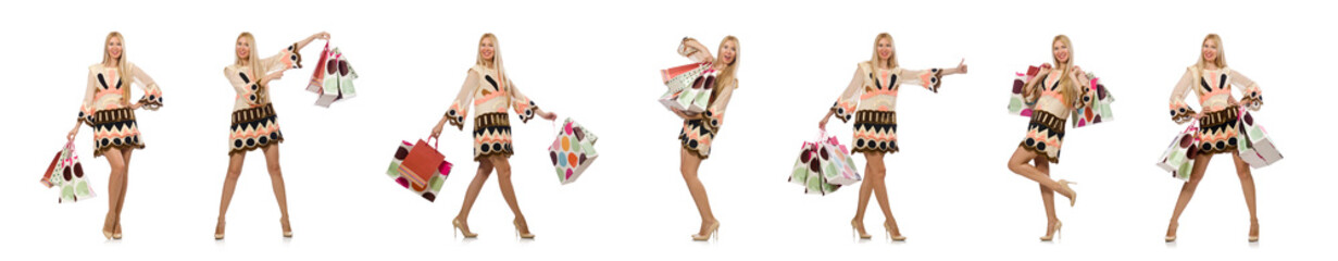 Woman with shopping bags on white
