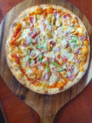pizza on a wooden table