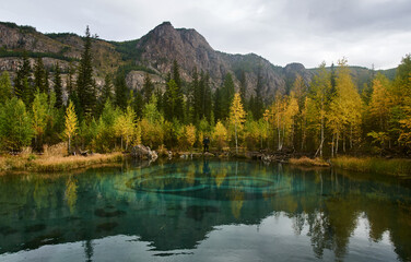 Fototapeta na wymiar Geyser lake near the village of Aktash in the Altai Mountains