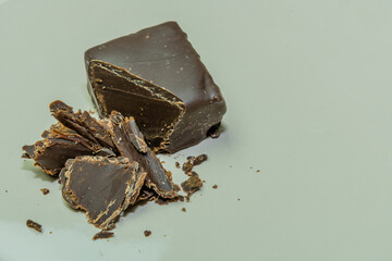 Single piece of dark chocolate