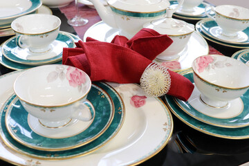 set of dishes. holiday table setting. table set for dinner. shop window with dishes