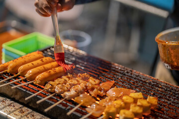 
Meatballs on skewers are granny on the stove.