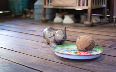 half of coconut shell with coconut grater kitchen