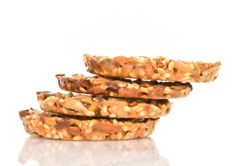 Several fresh fragrant tasty nutty cookies on a white background.