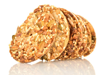 Several fresh fragrant tasty nutty cookies on a white background.