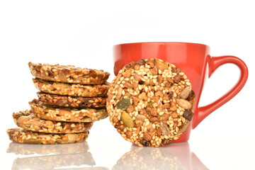 Several fresh fragrant tasty nutty cookies on a white background.