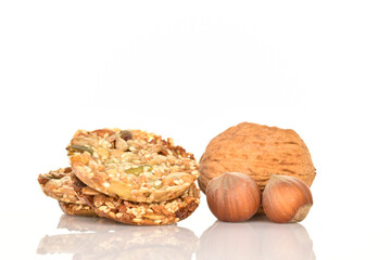 Several fresh fragrant tasty nutty cookies on a white background.
