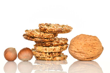 Several fresh fragrant tasty nutty cookies on a white background.