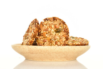 Several fresh fragrant tasty nutty cookies on a white background.