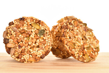 Several fresh fragrant tasty nutty cookies on a white background.
