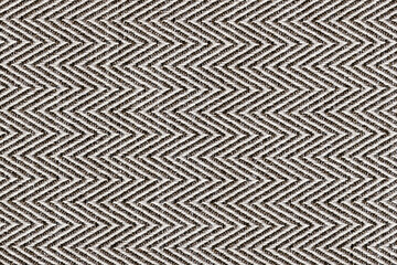 Dark brown with beige colors fabric sample Herringbone,zigzag pattern texture backdrop.Fabric strip line,Herringbone pattern design,upholstery for decoration interior design background..