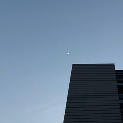 Fototapeta na wymiar crescent moon and building