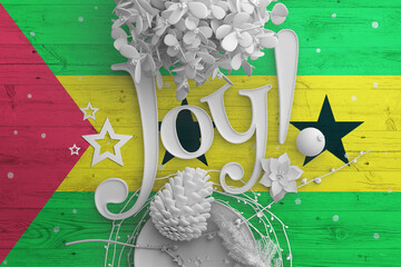 Sao Tome And Principe flag on wooden table with Joy text. Christmas and new year background,...