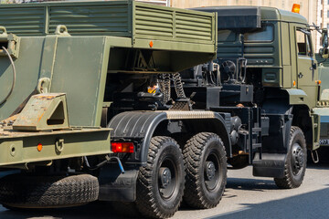View to the Russian military green camouflage kamaz truck. Best army and civil heavy goods vehicle. 