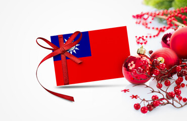 Taiwan flag on new year invitation card with red christmas ornaments concept. National happy new year composition.