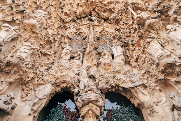 Sculptures and statues on the facade of the Sagrada Familia building.