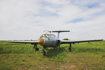 Fototapeta na wymiar Lonely abandoned vintage jet plane