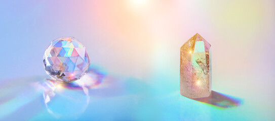 Crystals refracting light in rainbow colors. stone quartz and glass prism on holographic...