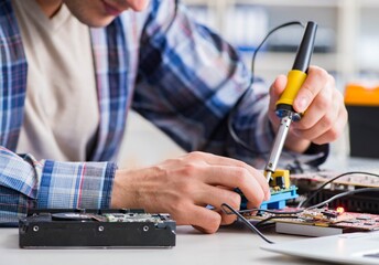 Computer hardware repair and fixing concept by experienced techn