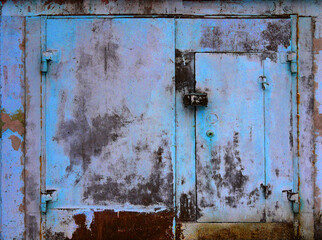 Metal garage doors painted by people as an abstract painting